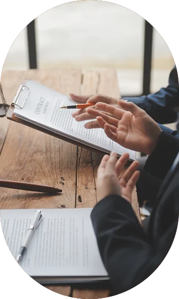 two persons holding a physical contract